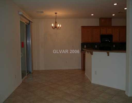9128 Ripple Ridge Avenue, Unit 103 Las Vegas, NV 89149 - Photo 5 of 8 Dining Room.