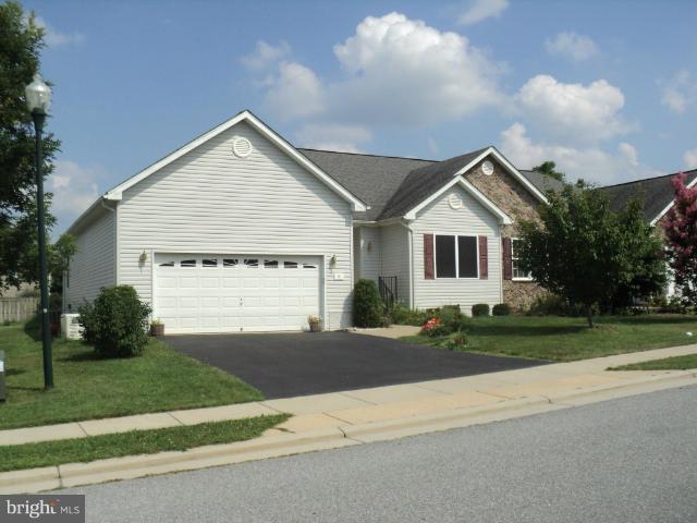56 Peter Rabbit Drive Ranson, WV 25438 - Photo 1 of 28 a view of a house next to a yard and road