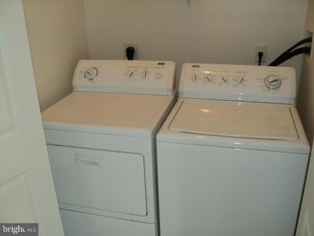 56 Peter Rabbit Drive Ranson, WV 25438 - Photo 14 of 28 a utility room with dryer and washer