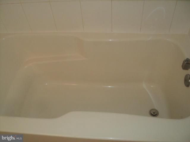56 Peter Rabbit Drive Ranson, WV 25438 - Photo 17 of 28 a bathroom with a bathtub
