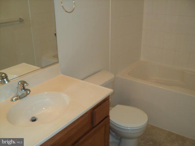56 Peter Rabbit Drive Ranson, WV 25438 - Photo 19 of 28 a bathroom with a sink a toilet and shower
