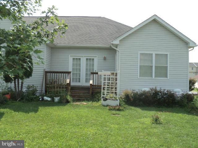 56 Peter Rabbit Drive Ranson, WV 25438 - Photo 3 of 28 a front view of a house with garden