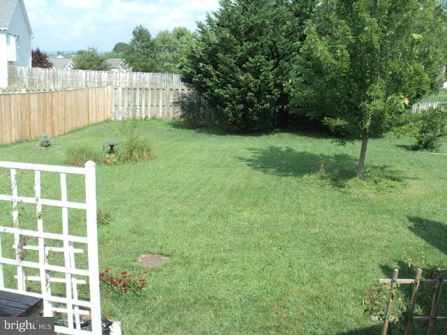 56 Peter Rabbit Drive Ranson, WV 25438 - Photo 5 of 28 a view of backyard with green space