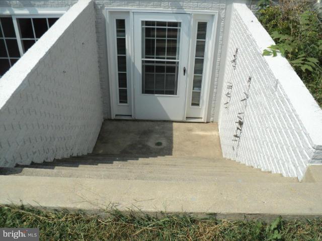 56 Peter Rabbit Drive Ranson, WV 25438 - Photo 7 of 28 a view of front door
