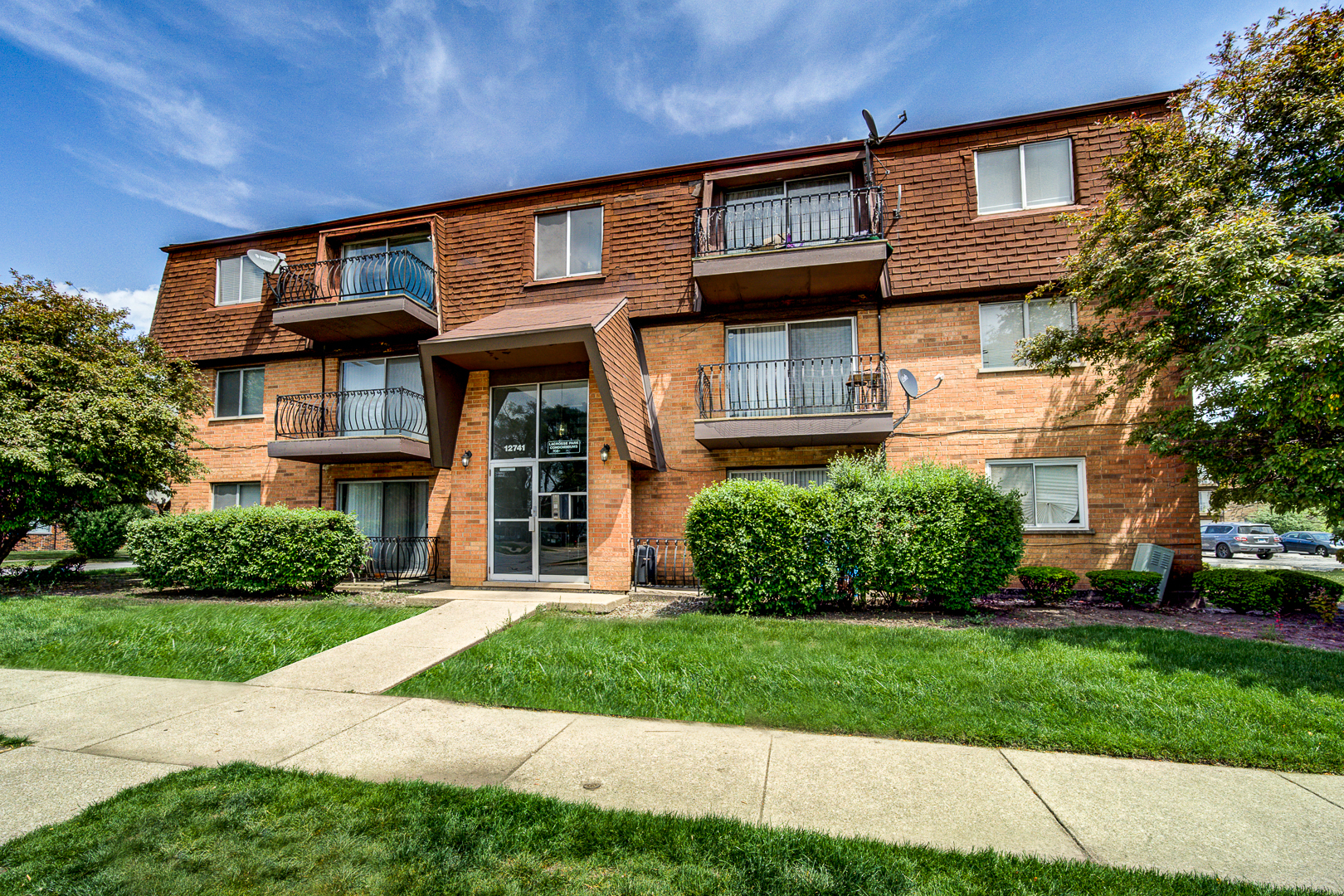 12741 South La Crosse Avenue, Unit 3A Alsip, IL 60803 - Photo 1 of 13 a view of brick building with a yard