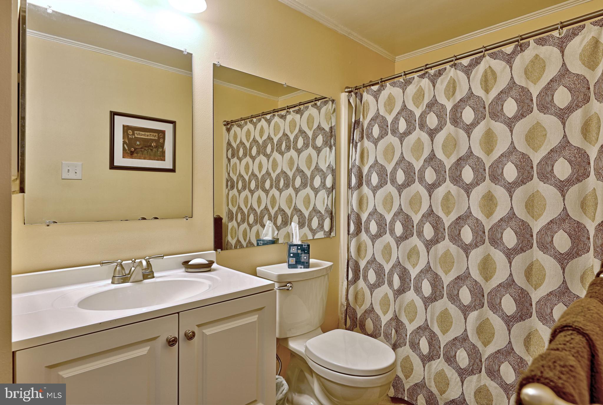 8 Meadow Drive Moorestown, NJ 08057 - Photo 24 of 36 a bathroom with a sink and a mirror