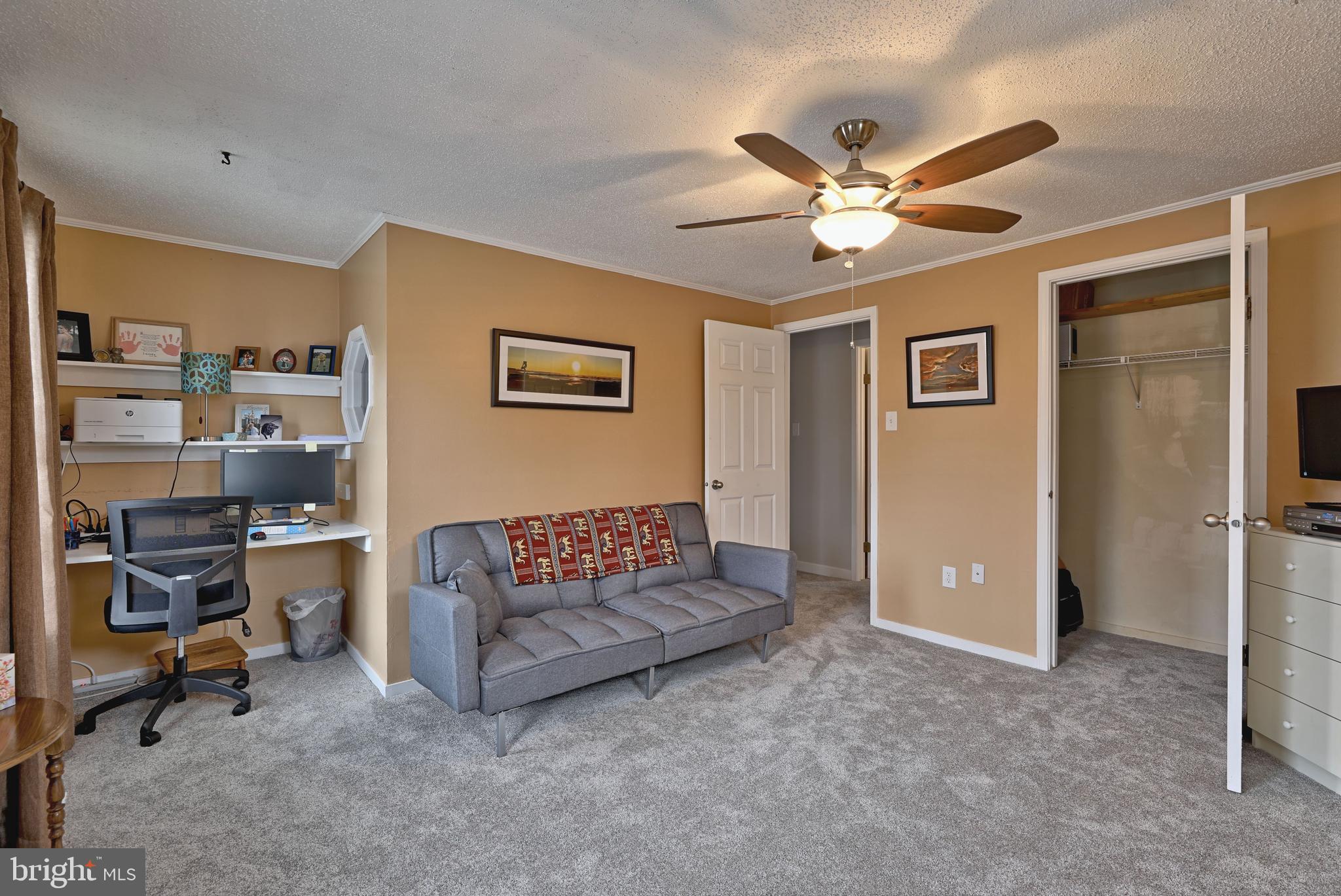 8 Meadow Drive Moorestown, NJ 08057 - Photo 28 of 36 a living room with furniture and a ceiling fan