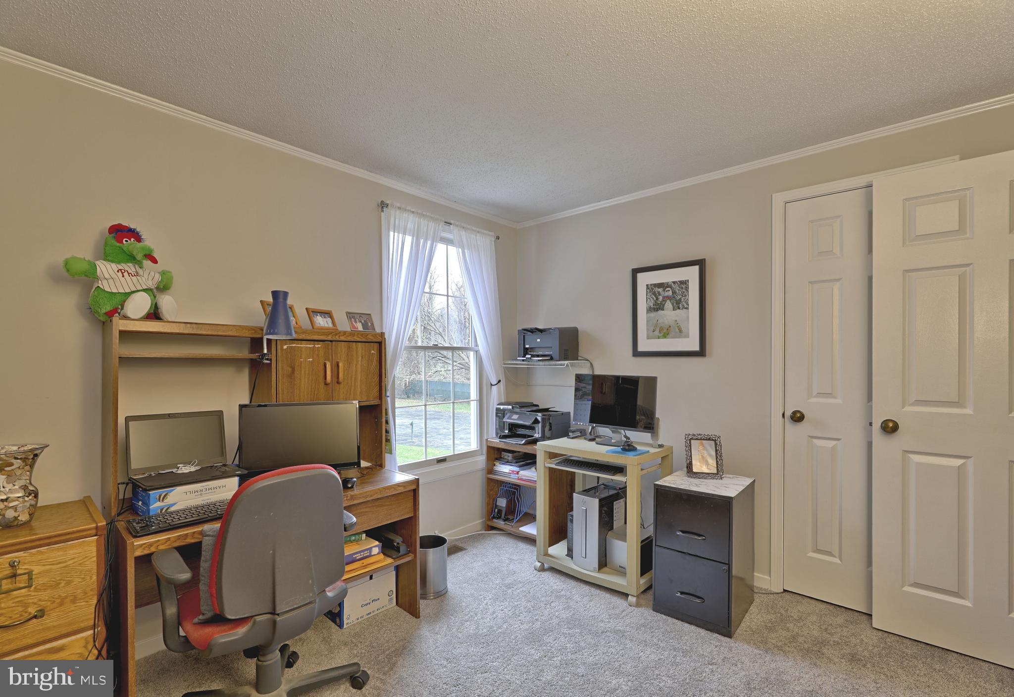 8 Meadow Drive Moorestown, NJ 08057 - Photo 30 of 36 a view of a workspace with furniture and a window