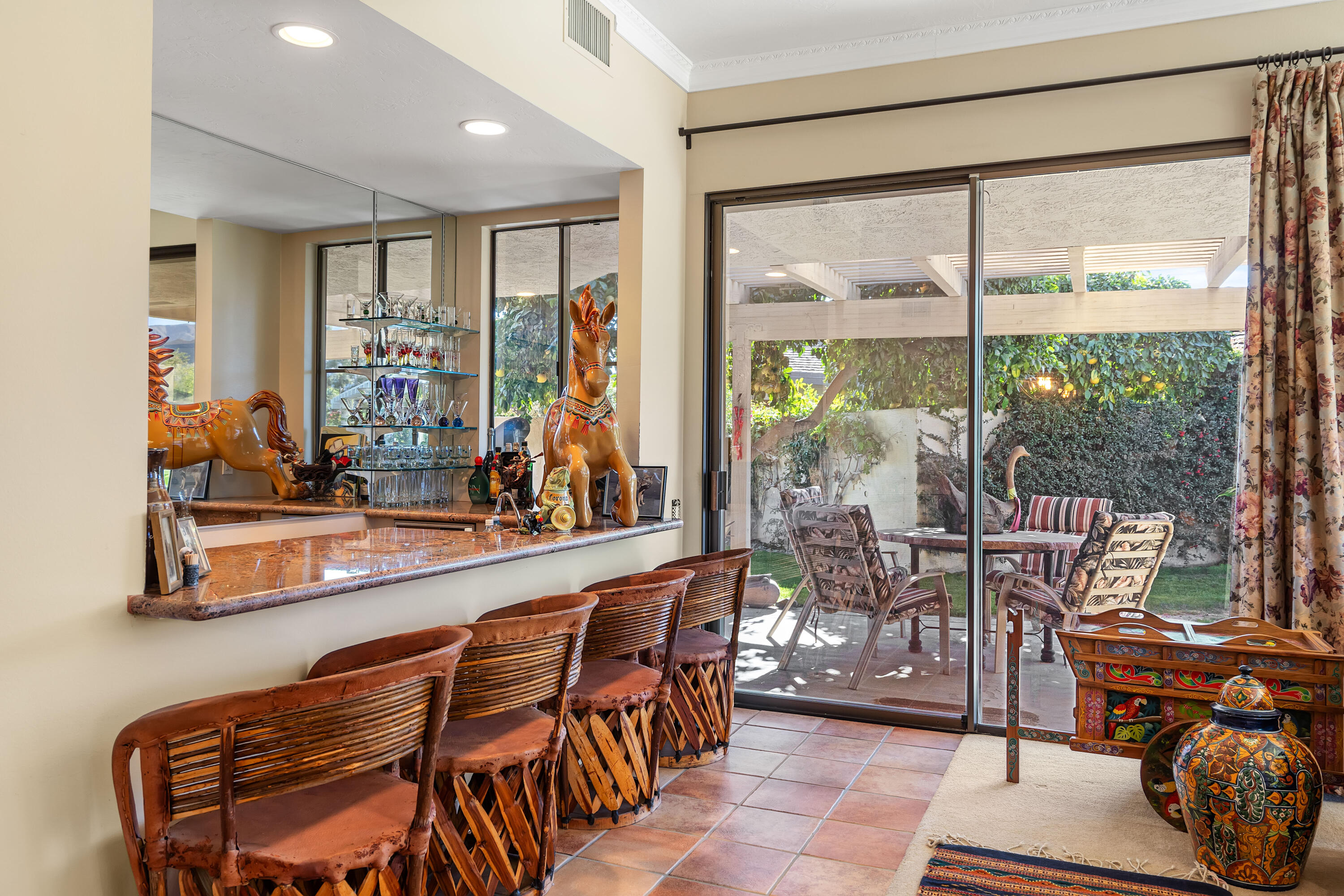 9 Swarthmore Court Rancho Mirage, CA 92270 - Photo 11 of 43 a view of a dining room with furniture window and outside view
