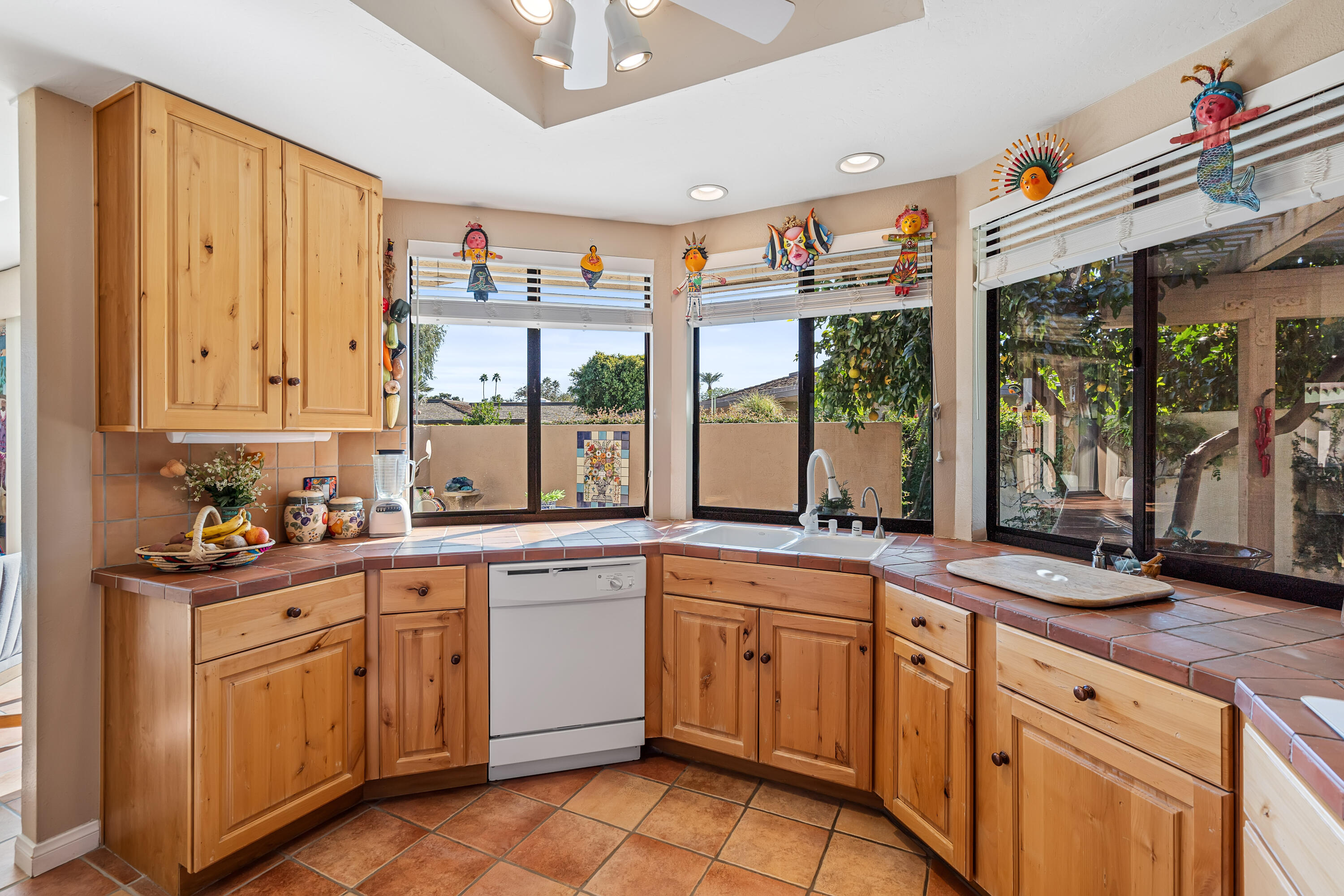 9 Swarthmore Court Rancho Mirage, CA 92270 - Photo 14 of 43 a kitchen with a sink stove and cabinets