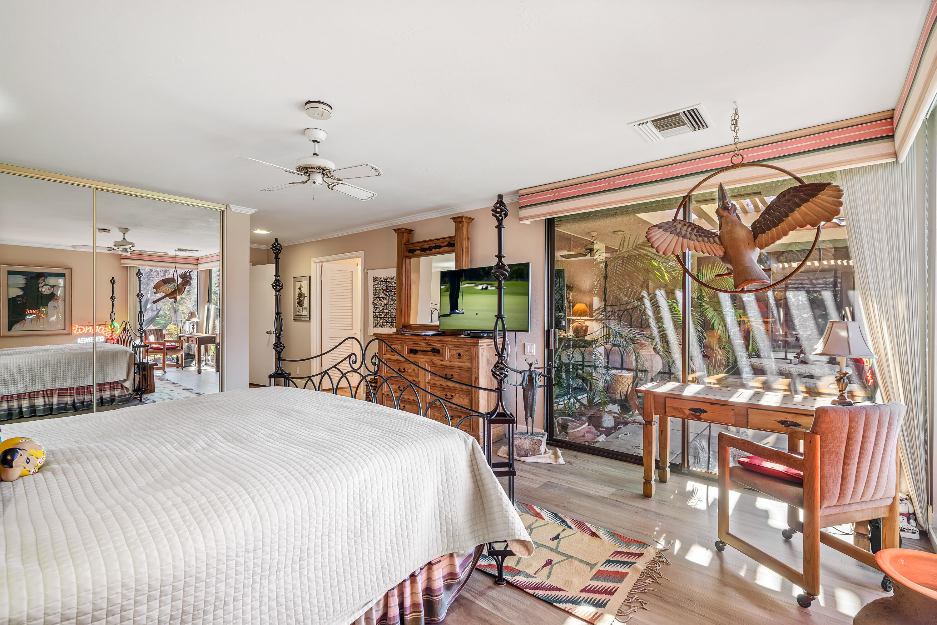 9 Swarthmore Court Rancho Mirage, CA 92270 - Photo 20 of 43 a bed room with a bed and a chair