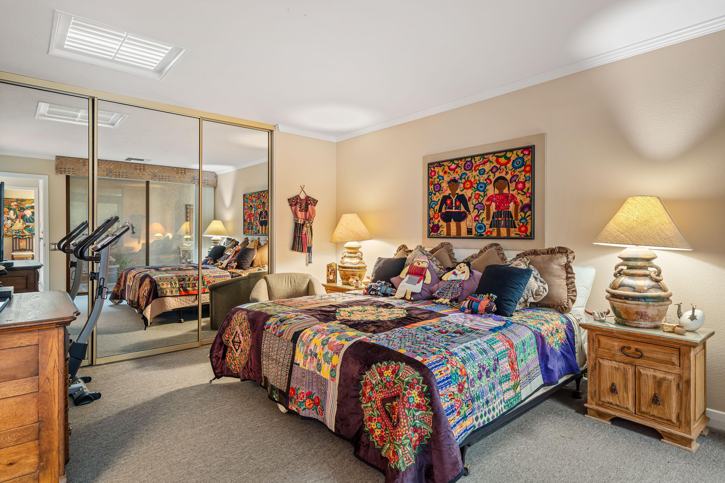 9 Swarthmore Court Rancho Mirage, CA 92270 - Photo 23 of 43 a bedroom with bed and a night stand