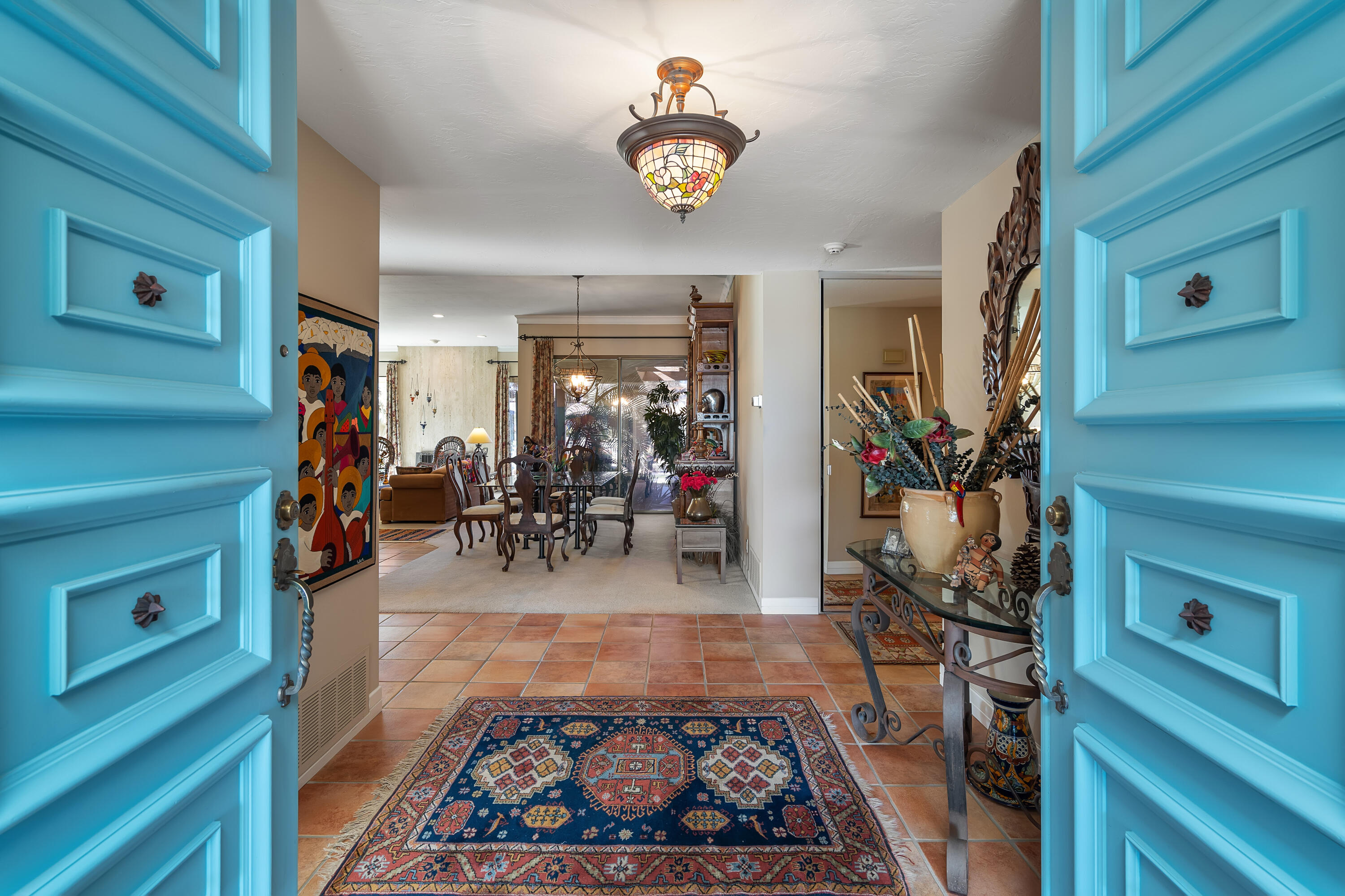 9 Swarthmore Court Rancho Mirage, CA 92270 - Photo 5 of 43 a view of a livingroom with furniture and a fireplace