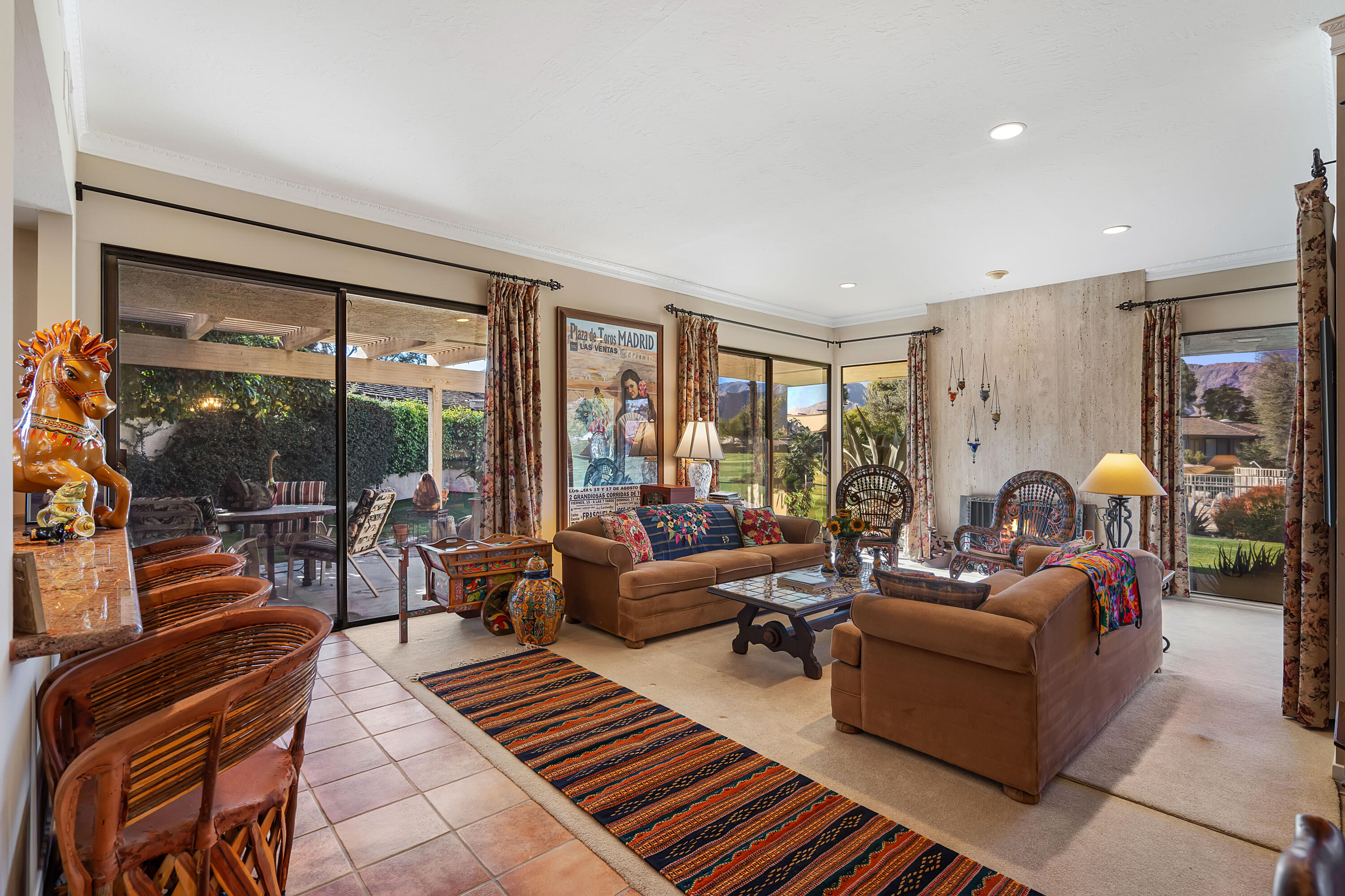 9 Swarthmore Court Rancho Mirage, CA 92270 - Photo 7 of 43 a living room with furniture and a large window