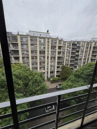 a view of a building from a balcony