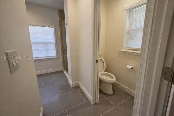 a kitchen with a sink and a window