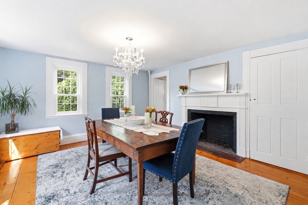 22 Stinson Road Andover, MA 01810 - Photo 11 of 40 a view of a dining room with furniture window and wooden floor