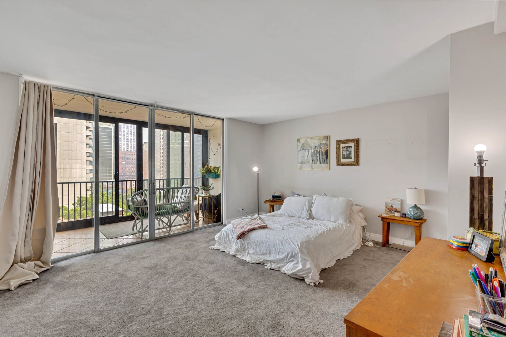1 East Schiller Street, Unit 12A Chicago, IL 60610 - Photo 6 of 13 a bedroom with a bed and large window