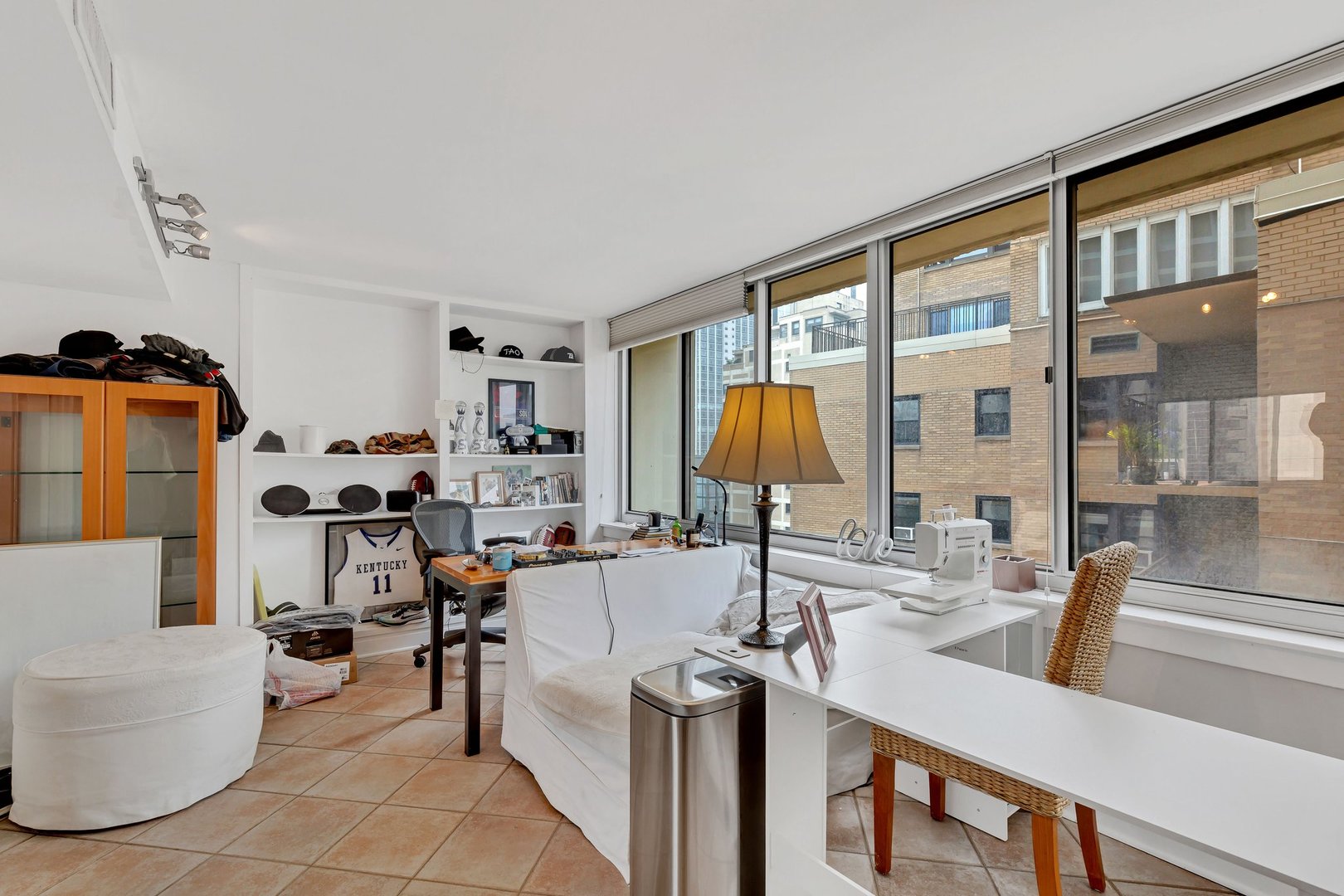 1 East Schiller Street, Unit 12A Chicago, IL 60610 - Photo 8 of 13 a view of living room with furniture and a large window