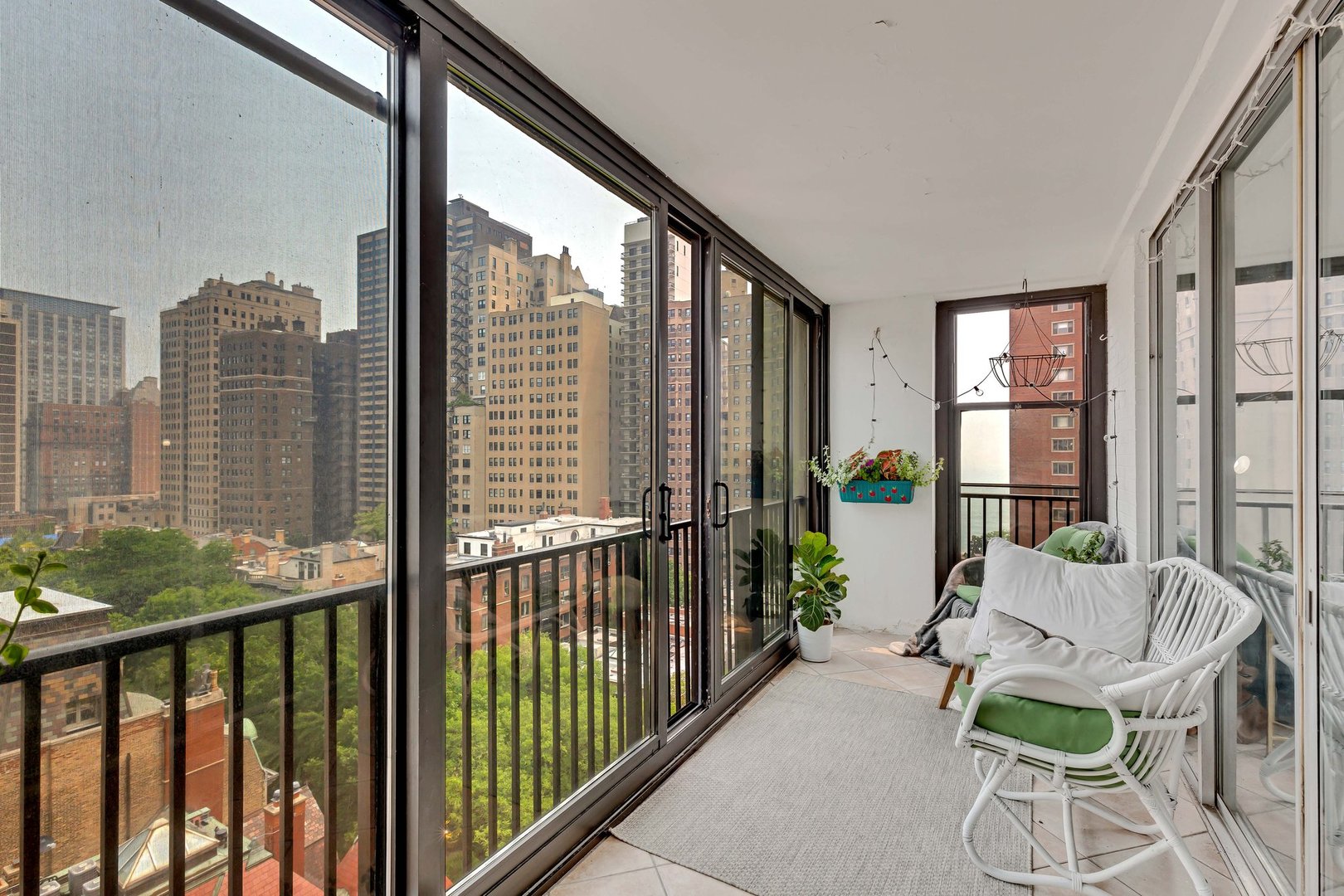 1 East Schiller Street, Unit 12A Chicago, IL 60610 - Photo 9 of 13 a view of a balcony with furniture