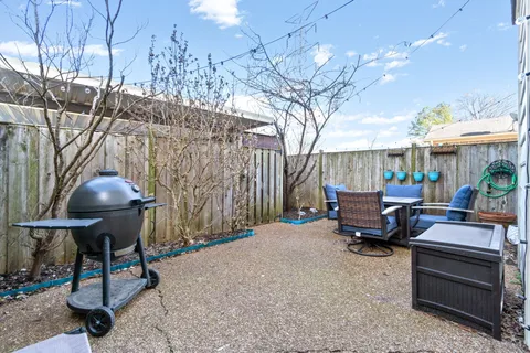 a view of a chairs and tables in patio