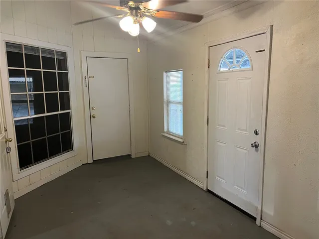 a view of empty room with front door