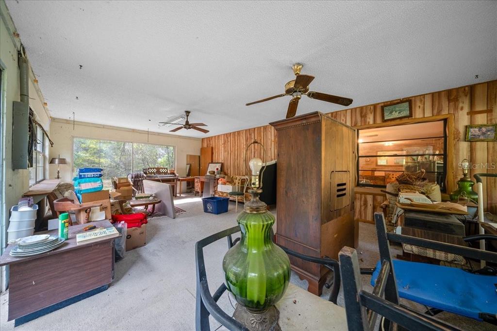 7173 West R Thomas Road Keystone Heights, FL 32656 - Photo 33 of 59 a gym room with lots of furniture and windows