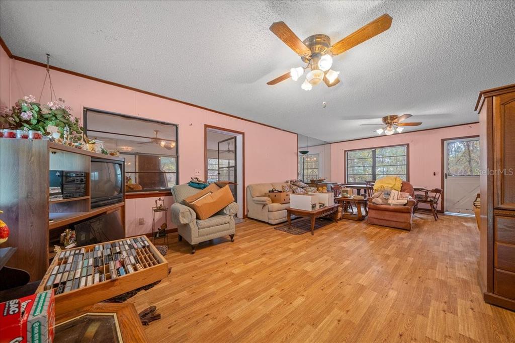 7173 West R Thomas Road Keystone Heights, FL 32656 - Photo 39 of 59 a bedroom with furniture and a large window