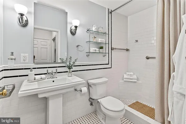 a view of a room with shelf on the wall