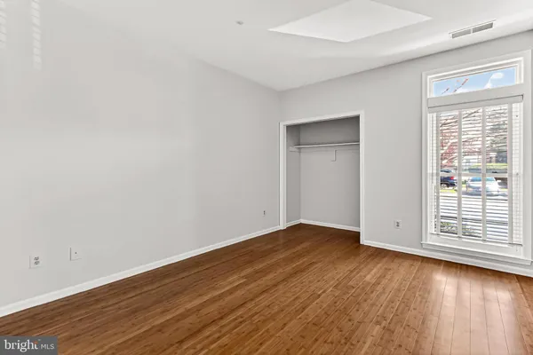 a close view of a utility room with dryer and washer