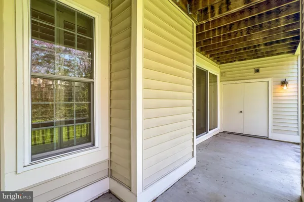 a view of a building with a yard