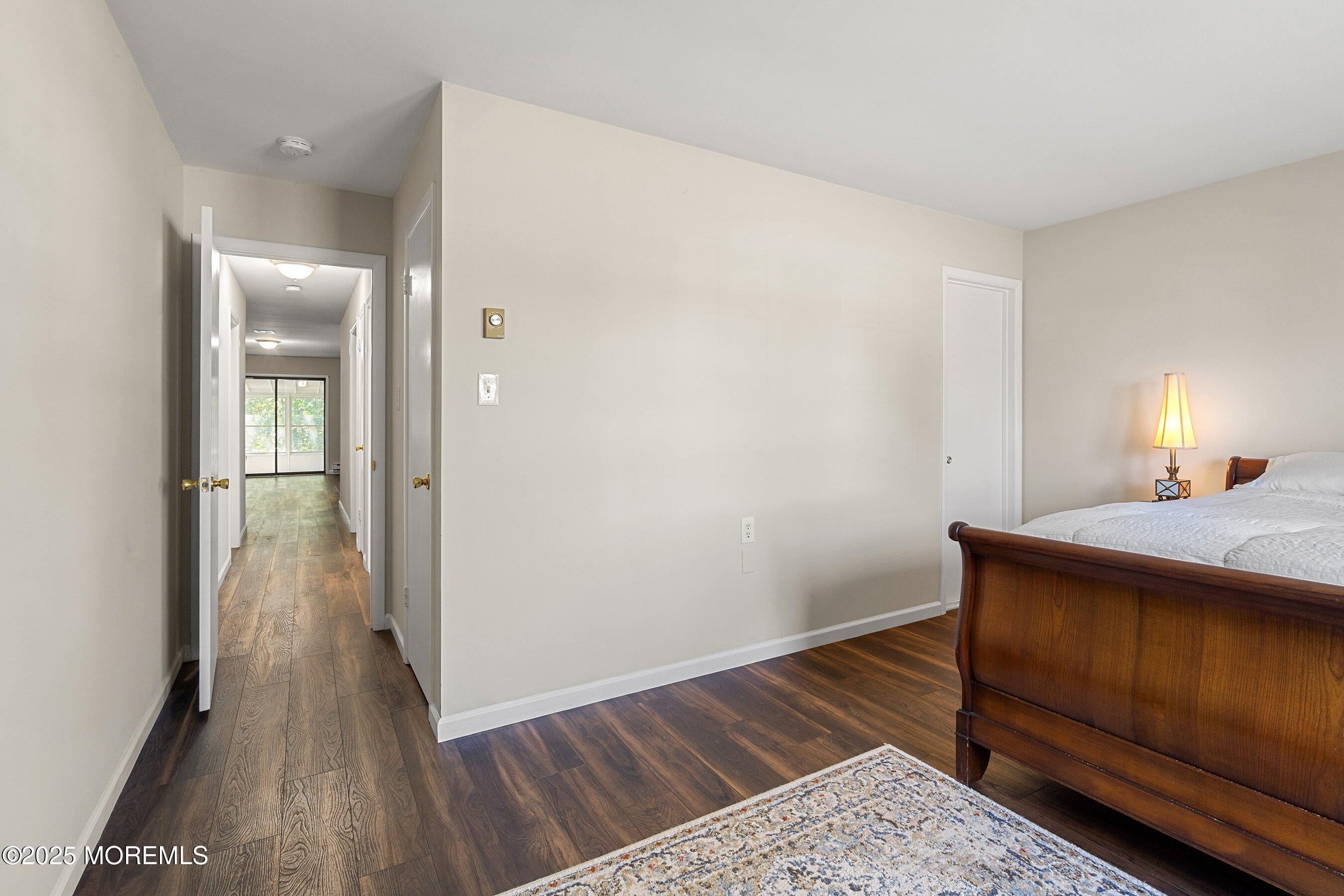 9 Whitney Court Brick, NJ 08724 - Photo 18 of 42 a view of bedroom with wooden floor