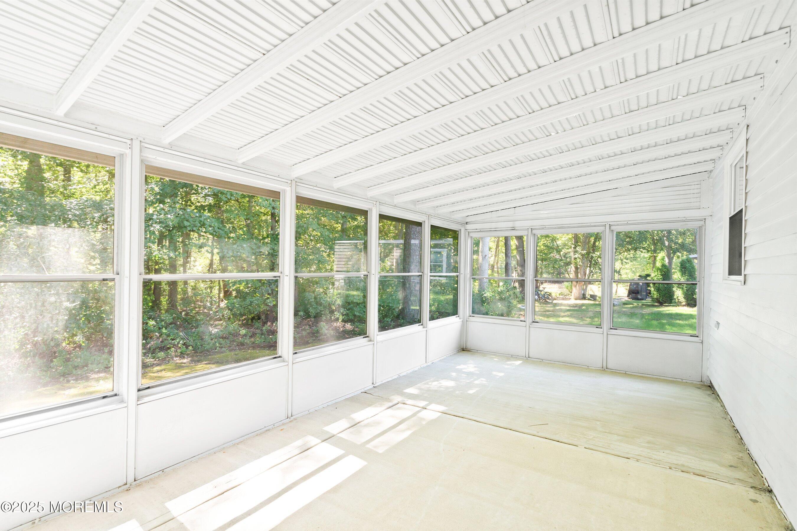 9 Whitney Court Brick, NJ 08724 - Photo 2 of 42 a view of a room with large windows