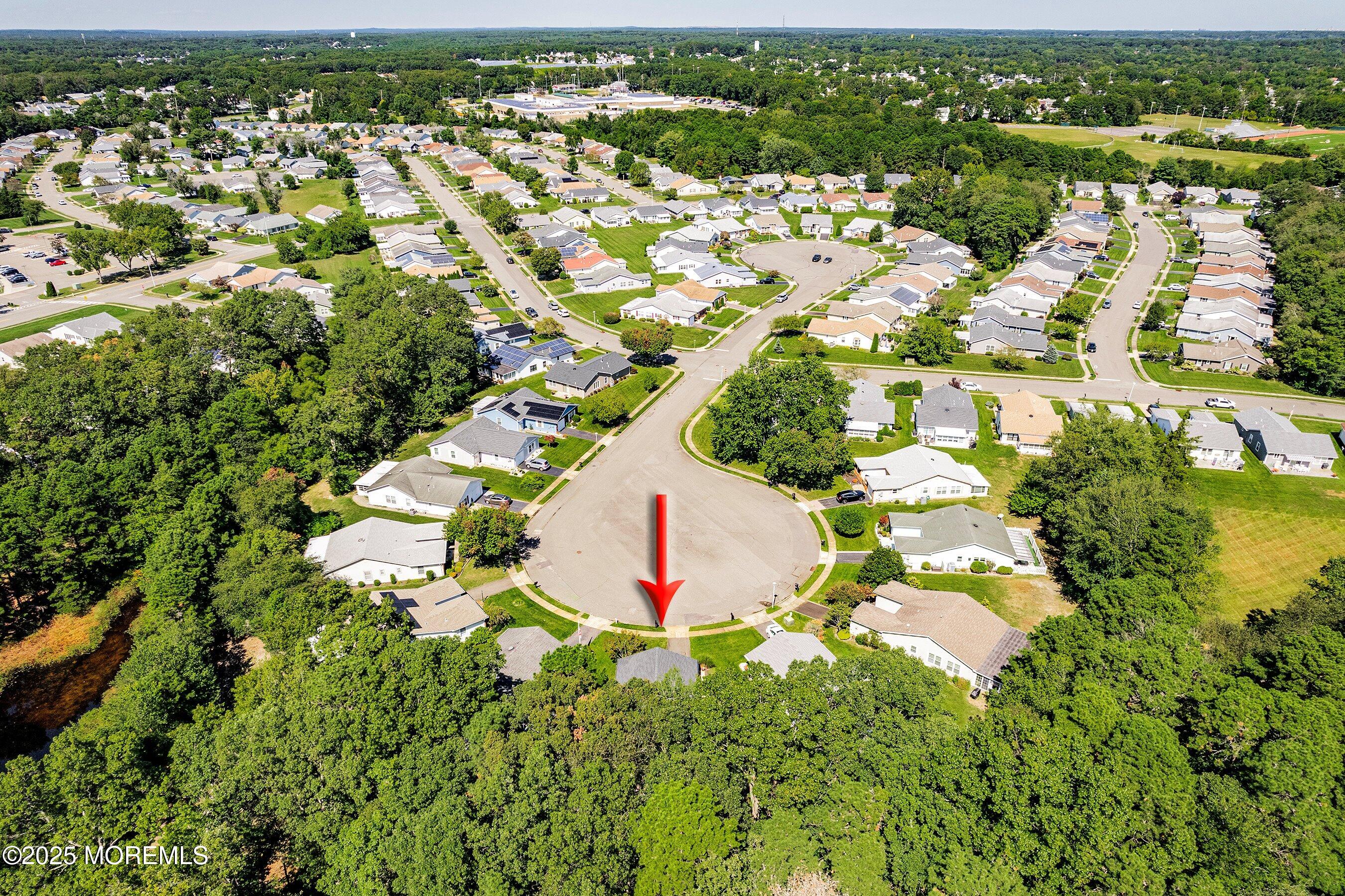9 Whitney Court Brick, NJ 08724 - Photo 21 of 42 an aerial view of residential houses with outdoor space and trees
