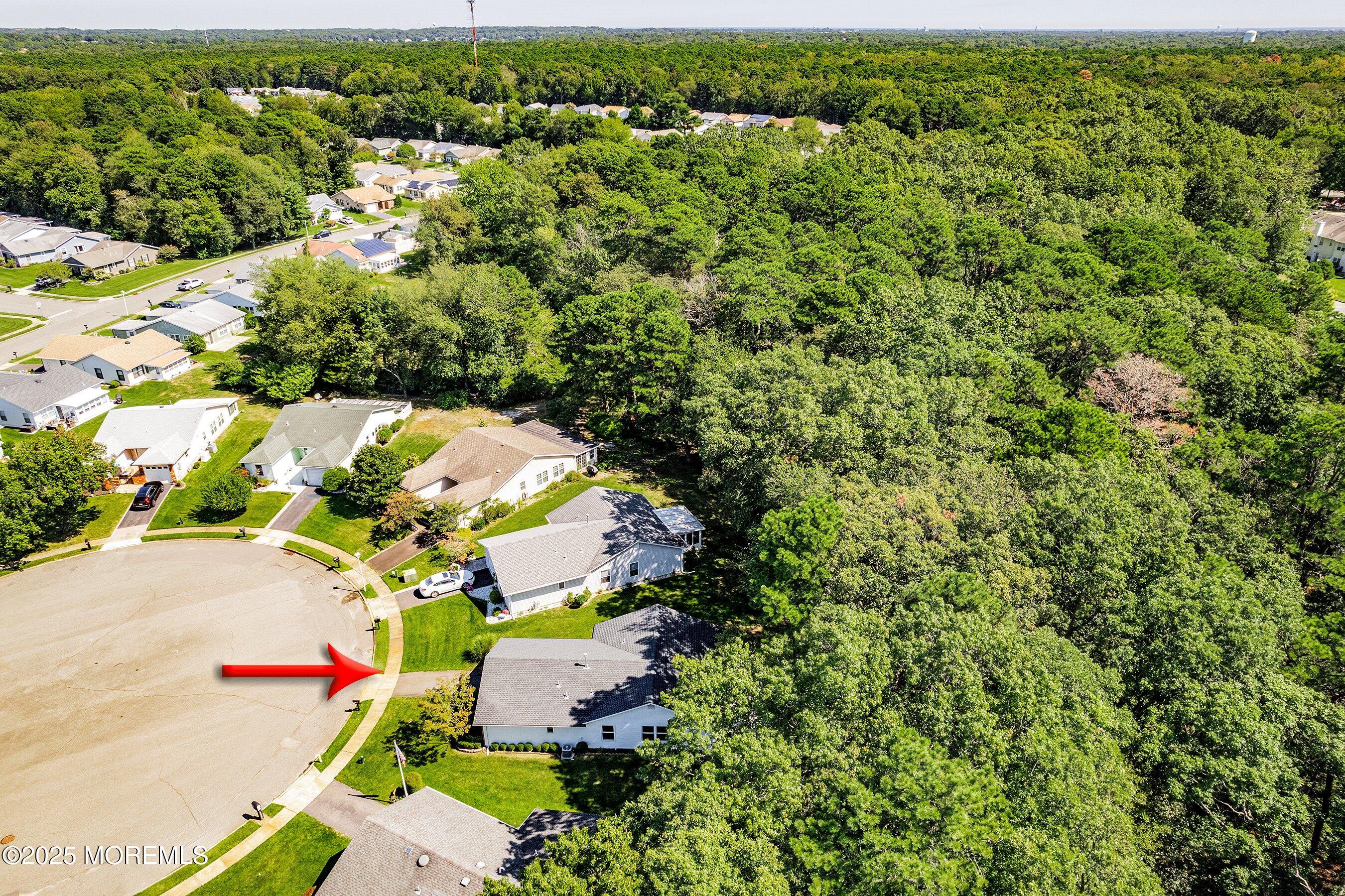 9 Whitney Court Brick, NJ 08724 - Photo 23 of 42 an aerial view of residential house with outdoor space and trees all around