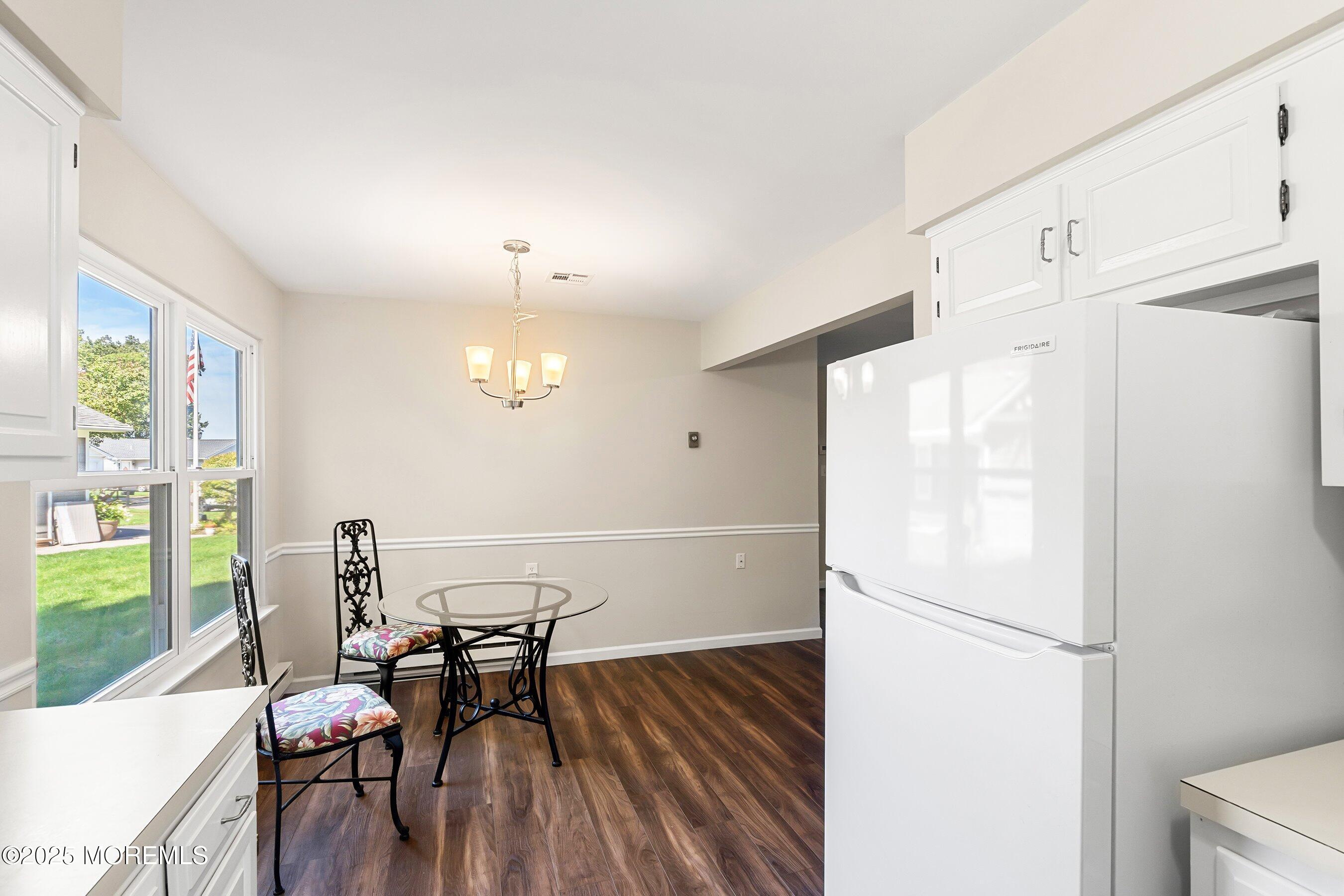 9 Whitney Court Brick, NJ 08724 - Photo 24 of 42 a view of a dining room with furniture window and outside view