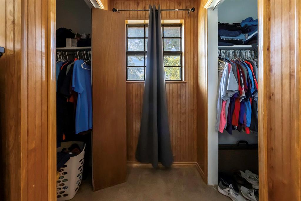 232 South Moseley Street De Leon, TX 76444 - Photo 15 of 39 a view of walk in closet with clothes