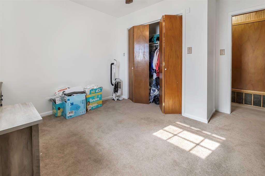 232 South Moseley Street De Leon, TX 76444 - Photo 20 of 39 a view of empty room with air conditioner and a window