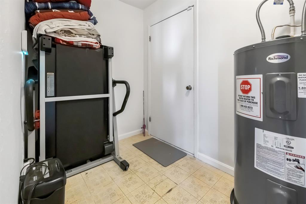 232 South Moseley Street De Leon, TX 76444 - Photo 26 of 39 a view of water heater room