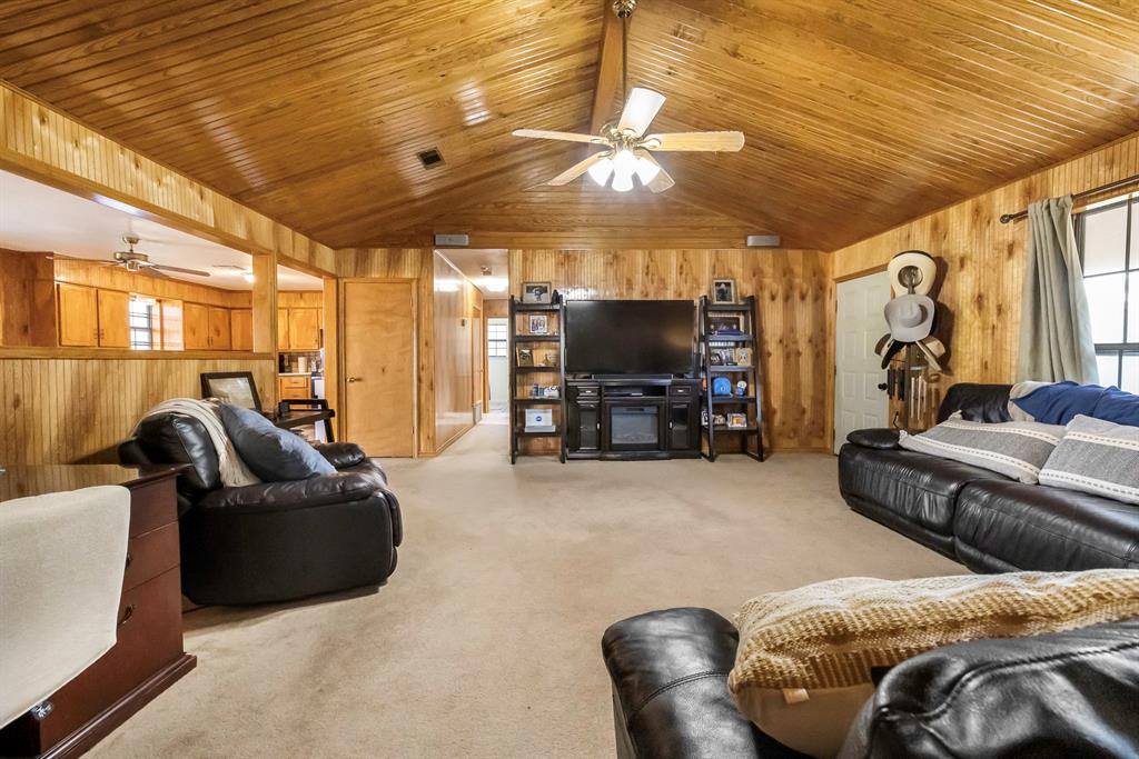 232 South Moseley Street De Leon, TX 76444 - Photo 3 of 39 a living room with furniture and a flat screen tv
