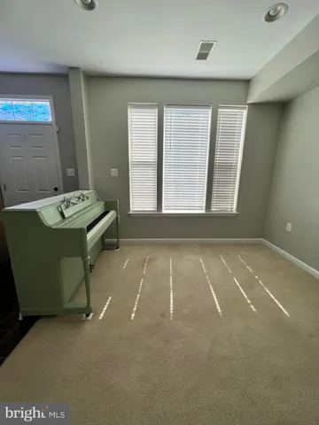 a room with a table and chairs