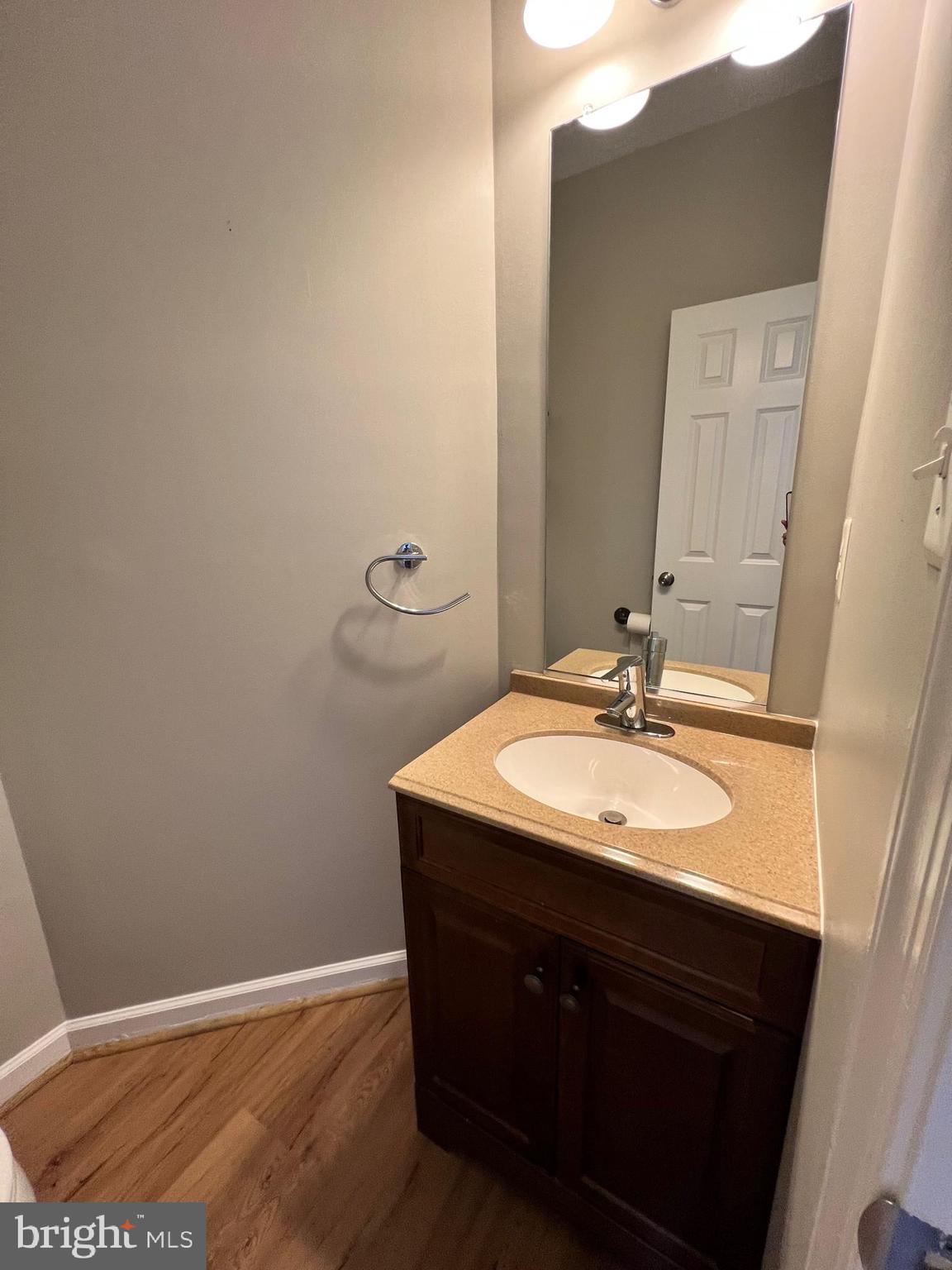 66 Davis Street Charles Town, WV 25414 - Photo 31 of 45 a bathroom with a sink and a mirror