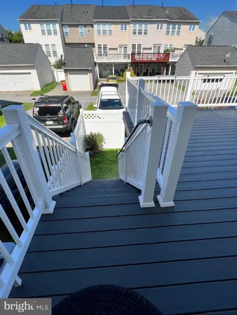 a view of a deck with furniture