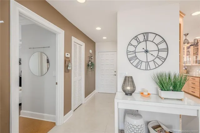 a bathroom with a granite countertop sink mirror and shower