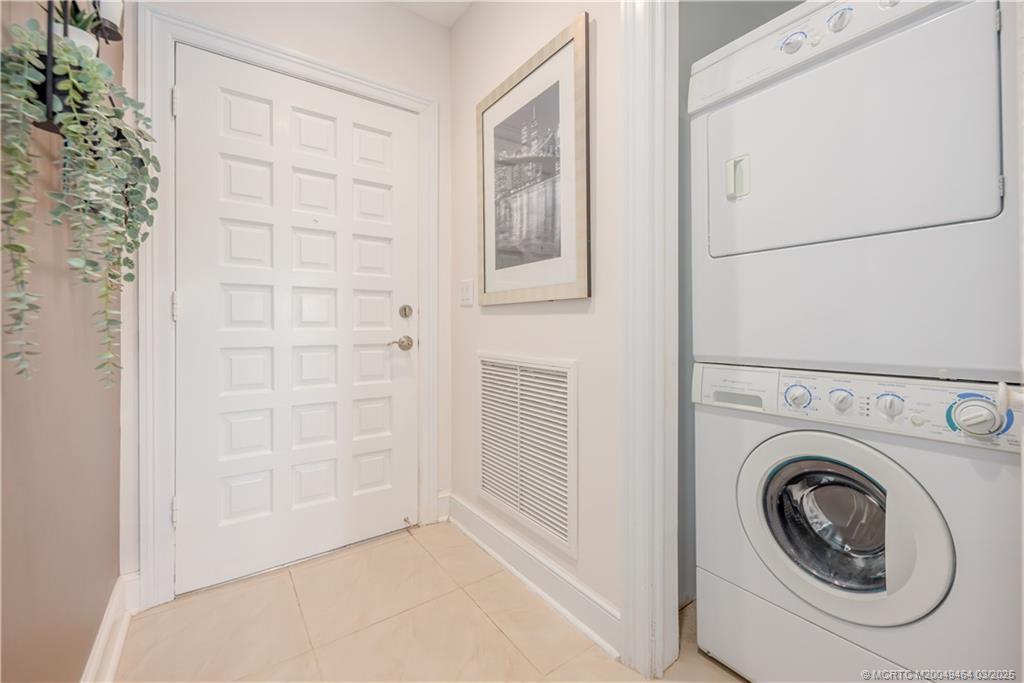 3901 Southeast St Lucie Boulevard, Unit 39 Stuart, FL 34997 - Photo 16 of 70 a utility room with dryer and washer