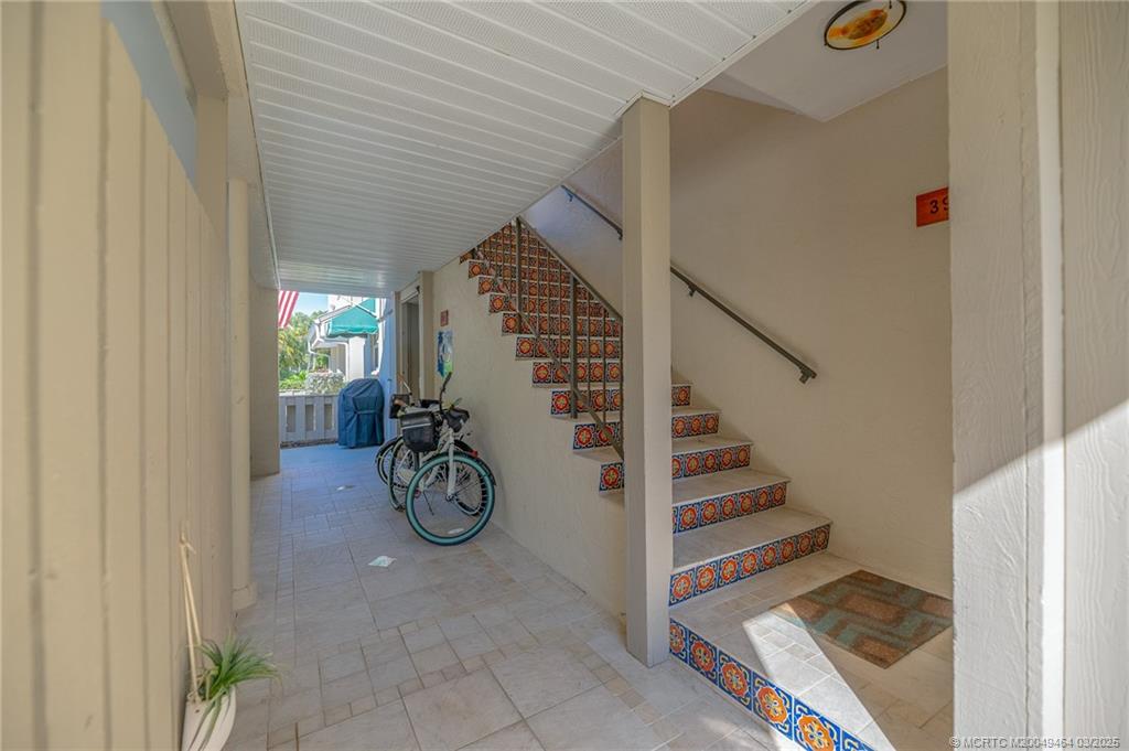 3901 Southeast St Lucie Boulevard, Unit 39 Stuart, FL 34997 - Photo 30 of 70 a view of entryway with wooden floor