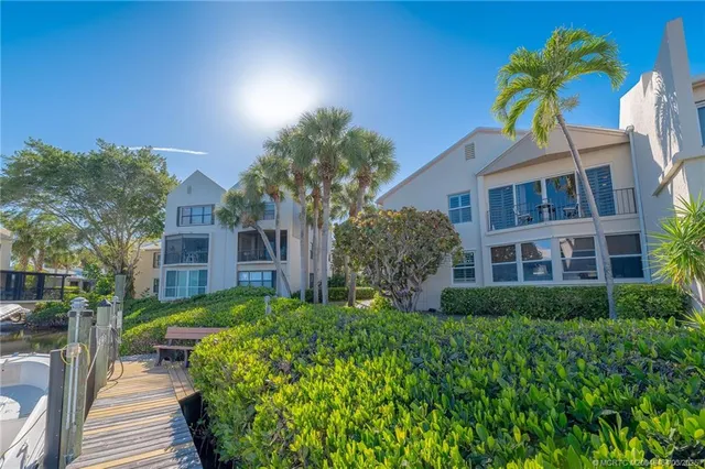 a view of backyard with a deck