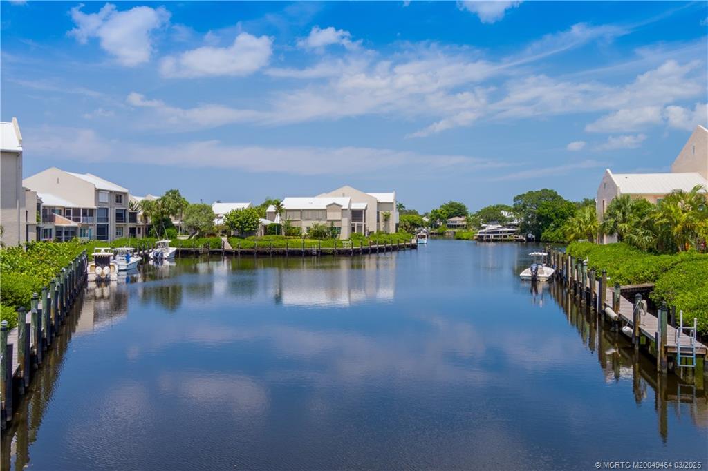 3901 Southeast St Lucie Boulevard, Unit 39 Stuart, FL 34997 - Photo 37 of 70 a view of a lake with a city