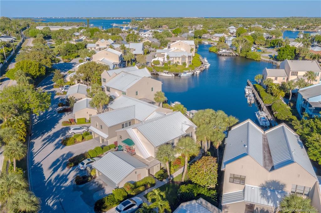 3901 Southeast St Lucie Boulevard, Unit 39 Stuart, FL 34997 - Photo 38 of 70 an aerial view of residential building with outdoor space and seating