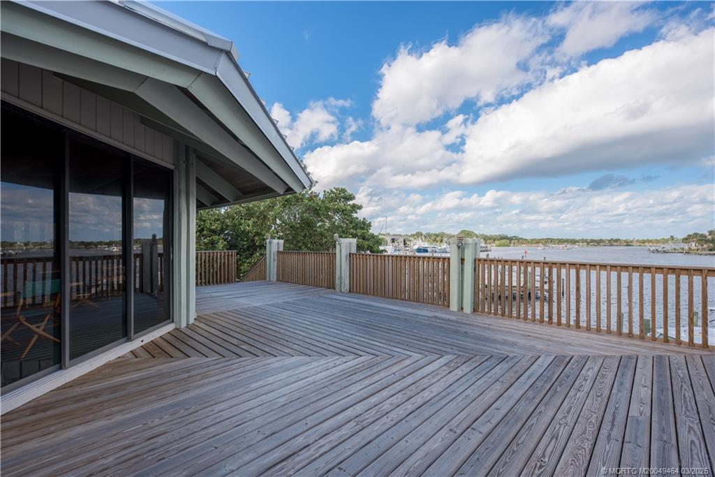 3901 Southeast St Lucie Boulevard, Unit 39 Stuart, FL 34997 - Photo 50 of 70 a view of backyard with a deck